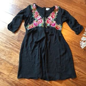 Black embroidered dress.